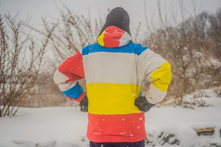 Person wearing a jacket in the snow