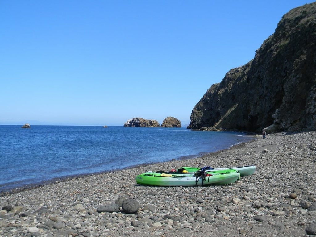 Sit on top kayaks on the shore