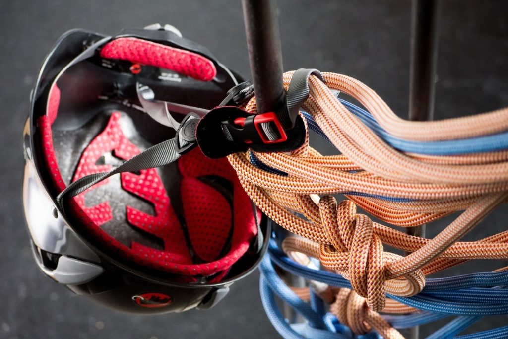 Red helmet and climbing ropes