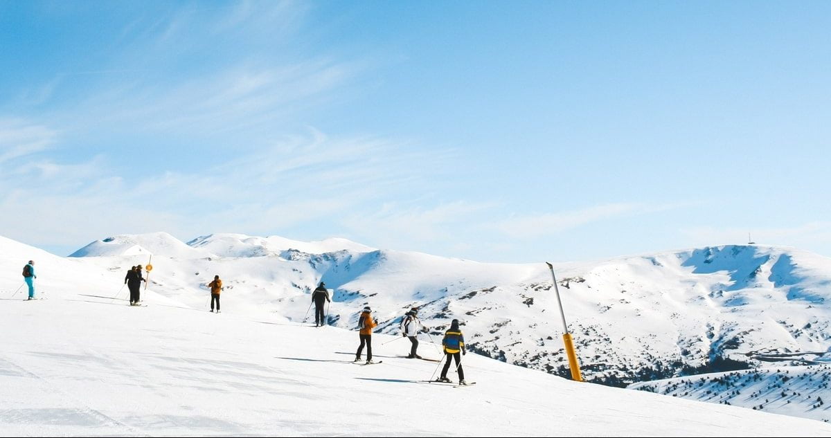 group-of-skiers-on-mountain