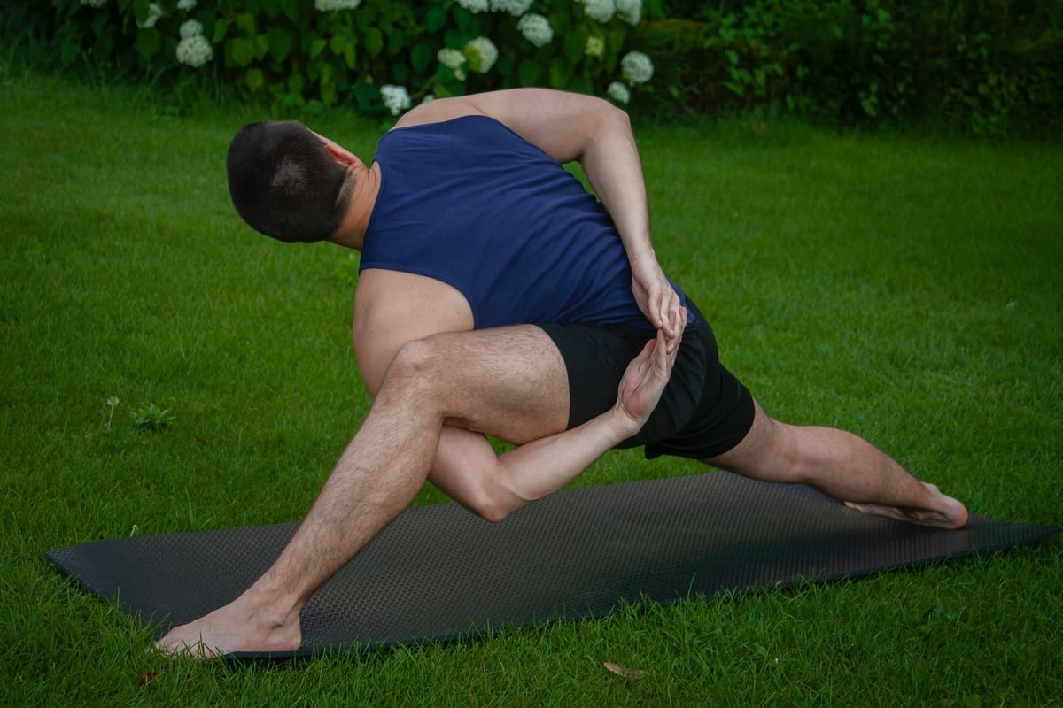 Man with hands behind back stretch